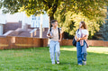 Students walking to school with backpacks and books - PhotoDune Item for Sale