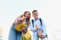 Schoolchildren giving thumbs up gesture outdoors - PhotoDune Item for Sale