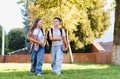 School children walking to class, talking outdoors - PhotoDune Item for Sale