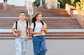 Students walking with backpacks and books to school - PhotoDune Item for Sale