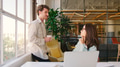 Young Businessman And Businesswoman Standing Next To Desk Having Informal Meeting - PhotoDune Item for Sale