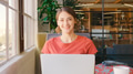 Portrait Of Young Smiling Businessman Working On Laptop In Modern Office - PhotoDune Item for Sale