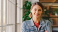 Portrait Of Young Smiling Businesswoman Standing In Modern Office - PhotoDune Item for Sale