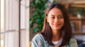 Portrait Of Young Smiling Businesswoman Standing In Modern Office - PhotoDune Item for Sale