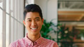 Portrait Of Young Smiling Businessman Standing In Modern Office - PhotoDune Item for Sale