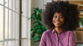 Portrait Of Young Smiling Businesswoman Standing In Modern Office - PhotoDune Item for Sale