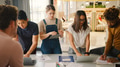 Young Multi Cultural Business Team Meeting Around Table In Modern Office - PhotoDune Item for Sale