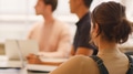 Close Up Of Young Multi Cultural Business Team Meeting Around Table In Modern Office - PhotoDune Item for Sale