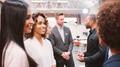 Business Team Standing Having Informal Meeting In Modern Office - PhotoDune Item for Sale