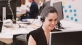 Female Customer Services Agent Working At Desk In Call Center - PhotoDune Item for Sale