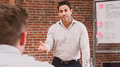 Mature Businessman Standing And Leading Office Meeting Around Table - PhotoDune Item for Sale