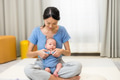 Happy mother play with her son indoor - PhotoDune Item for Sale