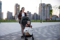 Mother and son walking outside with stroller - PhotoDune Item for Sale