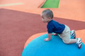 Baby son crawl around colourful playground - PhotoDune Item for Sale
