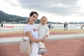 Mother holding baby in outdoor - PhotoDune Item for Sale
