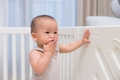 Baby touching his mouth at home - PhotoDune Item for Sale
