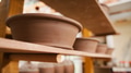 Group Of Handmade Clay Bowls On Shelves Of Ceramics Studio - PhotoDune Item for Sale