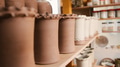 Group Of Glazed And Unglazed Vases On Shelves Of Ceramics Studio - PhotoDune Item for Sale