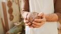 Close Up Of Male Potter Holding Lump Of Clay In Ceramics Studio - PhotoDune Item for Sale