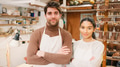 Portrait Of Couple Running Bespoke Pottery Business Working In Ceramics Studio Together - PhotoDune Item for Sale