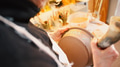 Close Up Of Male Potter Putting Lettering Onto Bread Bowl In Ceramics Studio - PhotoDune Item for Sale