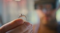 Close Up Of Male Jeweller Looking At Ring Through Headband Magnifiers In Studio - PhotoDune Item for Sale
