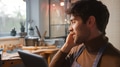 Male Jeweller Making Phone Call Looking At Design On Digital Tablet In Studio - PhotoDune Item for Sale