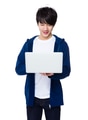 Asian man use of the laptop computer - PhotoDune Item for Sale