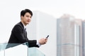 Businesssman holding with mobile phone - PhotoDune Item for Sale