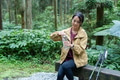 Hiking woman drink a water bottle at forest - PhotoDune Item for Sale