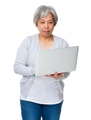 Grandmother use of the laptop computer - PhotoDune Item for Sale
