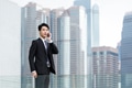 Asian Businessman make a call on cellphone at Hong Kong - PhotoDune Item for Sale