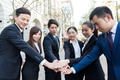 Group of business people joining hands together - PhotoDune Item for Sale