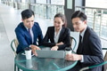 Group of business people discuss a deal at coffee shop - PhotoDune Item for Sale