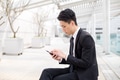 Asian businessman use of cellphone - PhotoDune Item for Sale