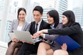 Business people working on laptop computer together - PhotoDune Item for Sale