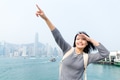 Woman look far way in Victoria Harbor of Hong Kong - PhotoDune Item for Sale