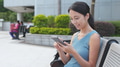 Woman use of smart phone at outdoor - PhotoDune Item for Sale