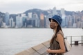 Woman travel with face mask exploring Hong Kong city view - PhotoDune Item for Sale