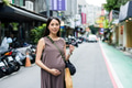 Pregnant Woman Exploring Taipei City Urban Landscape - PhotoDune Item for Sale