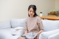 Housewife feel stress for doing housework at home, fold the clothes - PhotoDune Item for Sale