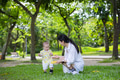 Mother play with her son at park - PhotoDune Item for Sale