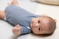 Newborn Baby Resting Safely on Cozy Mat - PhotoDune Item for Sale