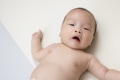 Cute baby lying on soft mat - PhotoDune Item for Sale