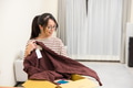 Woman Opening Parcel Delivery from Online Shopping - PhotoDune Item for Sale