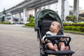 Baby Enjoying City Walk in Stroller - PhotoDune Item for Sale