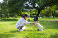 Mother holding her baby hand in park - PhotoDune Item for Sale