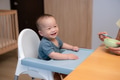 Little son feed with baby food by spoon - PhotoDune Item for Sale