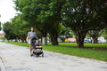 Woman spending day with baby at green park - PhotoDune Item for Sale