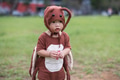 Toddler in Halloween cockroach outfit on lawn - PhotoDune Item for Sale